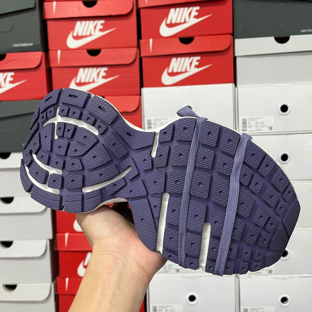 Dark blue knit sneaker outsole with raised tread pattern