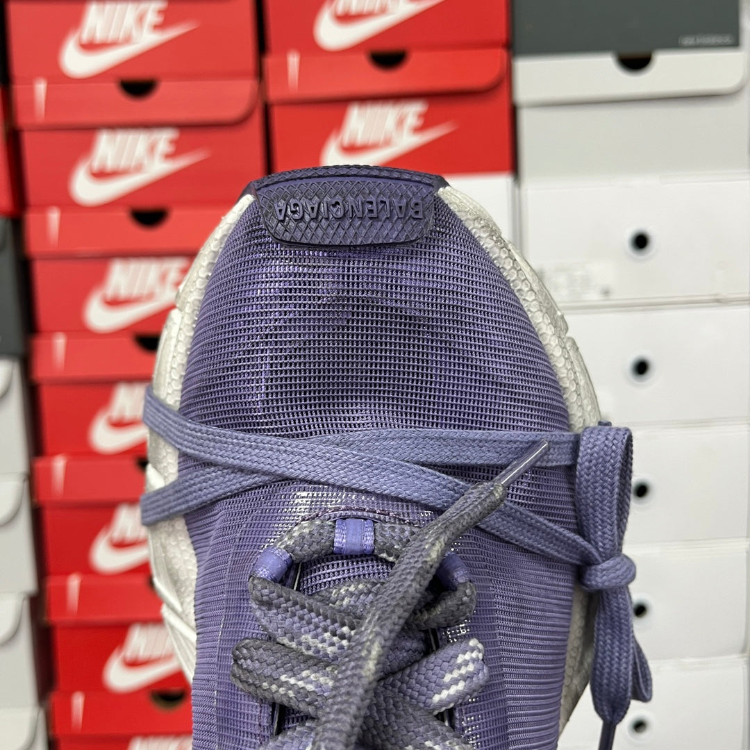 Dark blue knit sneaker upper with padded collar and lace ties