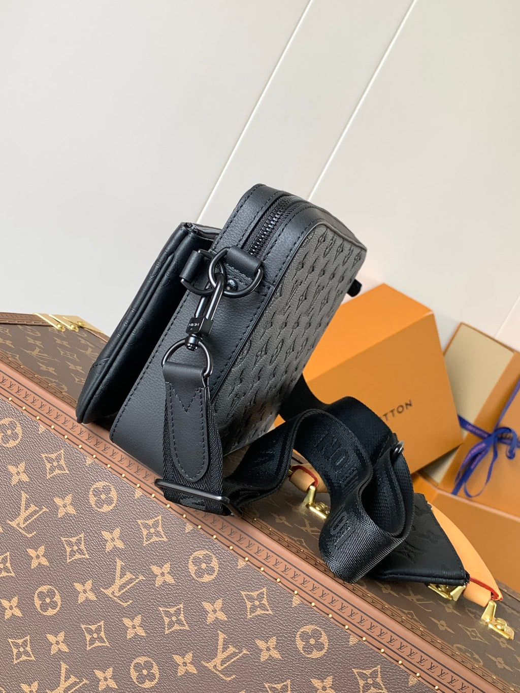 Men's Louis Vuitton monogram bag, dark gray, with top handle and adjustable strap