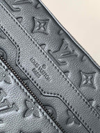Louis Vuitton monogram bag, dark gray leather, logo embossing and stitched panel