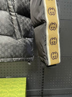 Quilted puffer jacket sleeve with Gucci logo stripe trim in yellow and black
