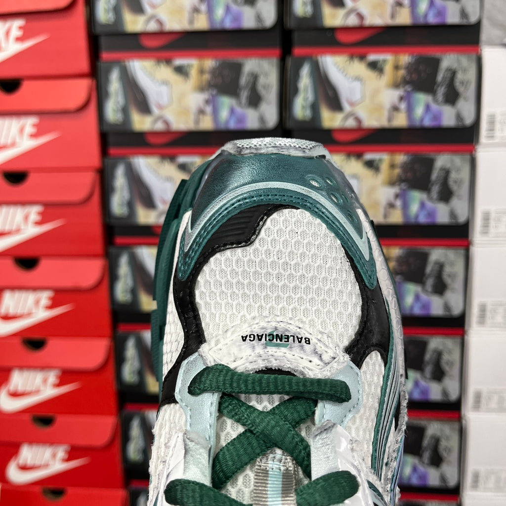 Balenciaga unisex running shoes, side view with white mesh and teal panels, green laces