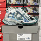 Balenciaga unisex running shoes on box, white mesh uppers with teal accents and green laces