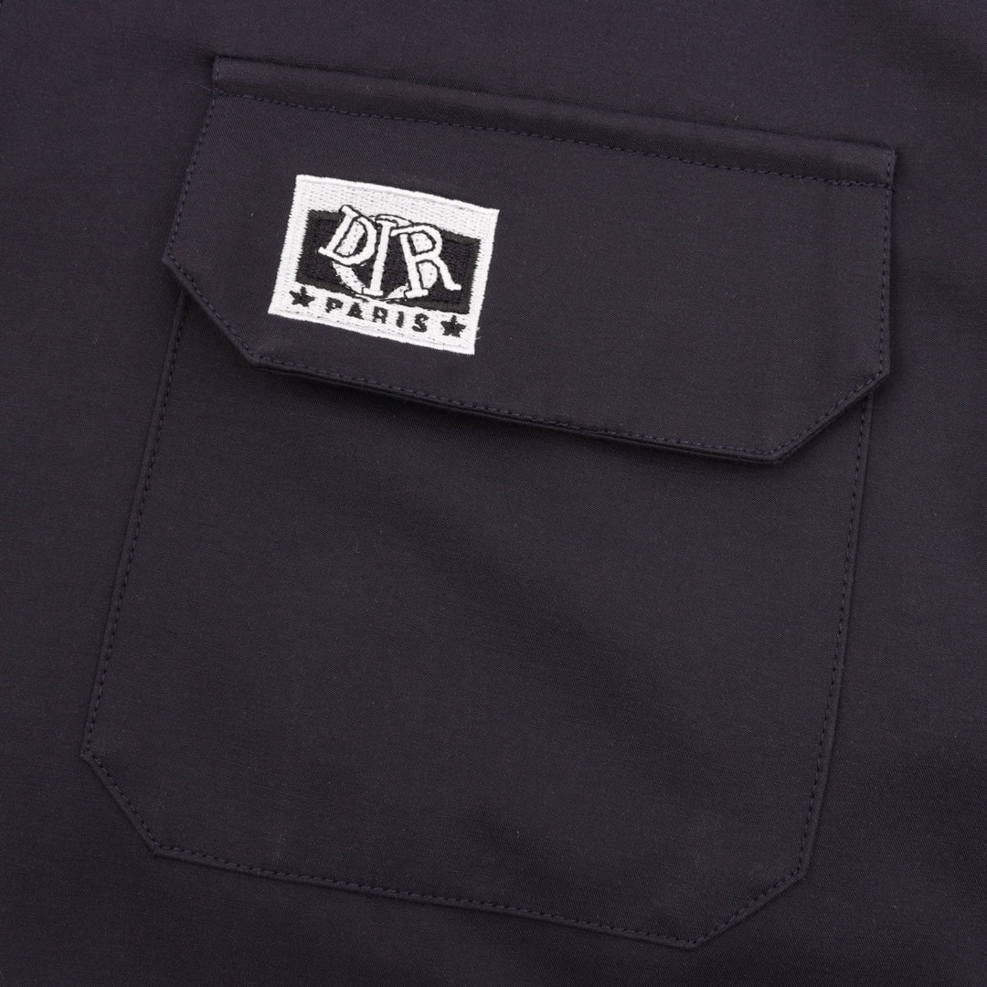 Dior jacket chest pocket with DR Paris logo patch