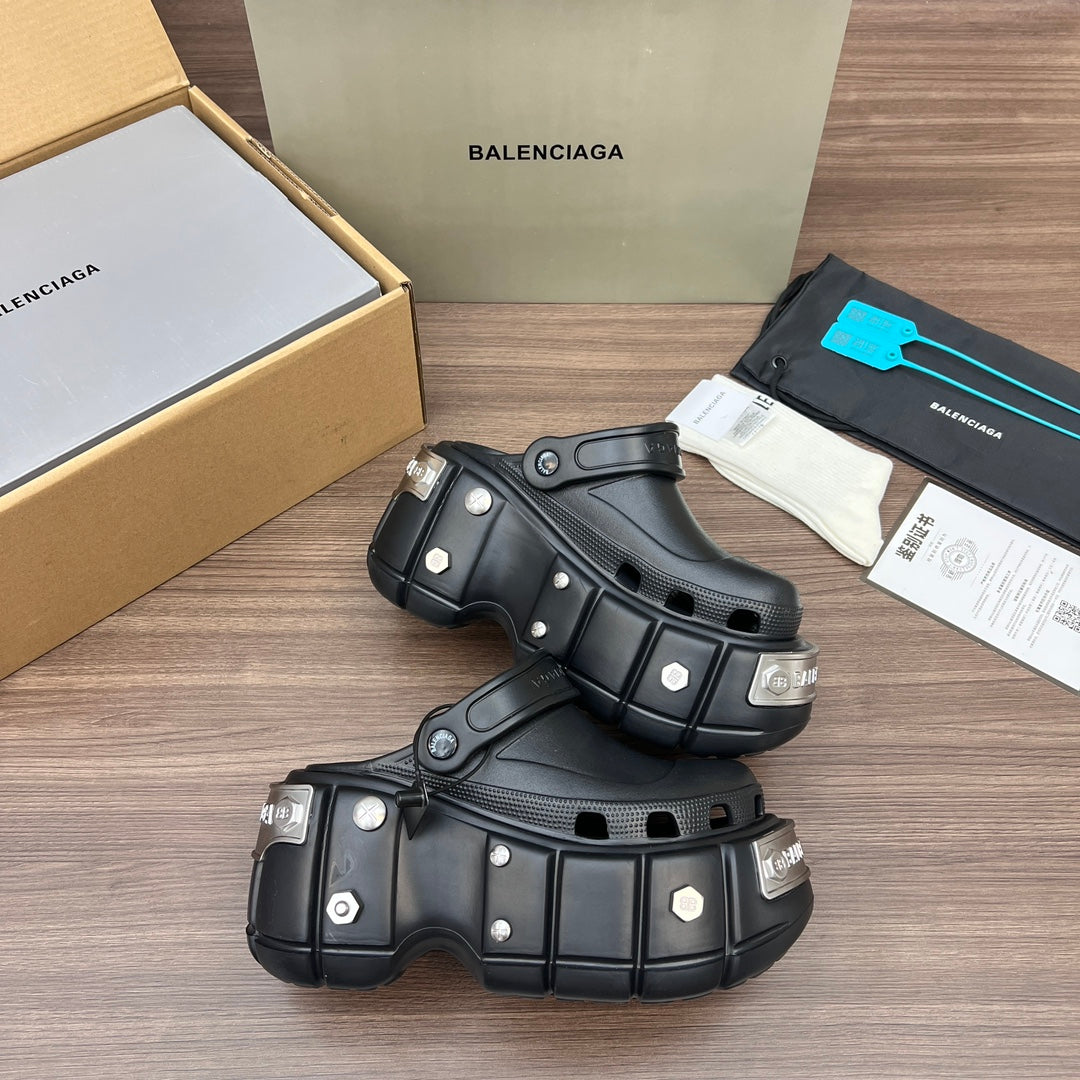 Black Balenciaga sandals with studmed strap panels and thick platform sole