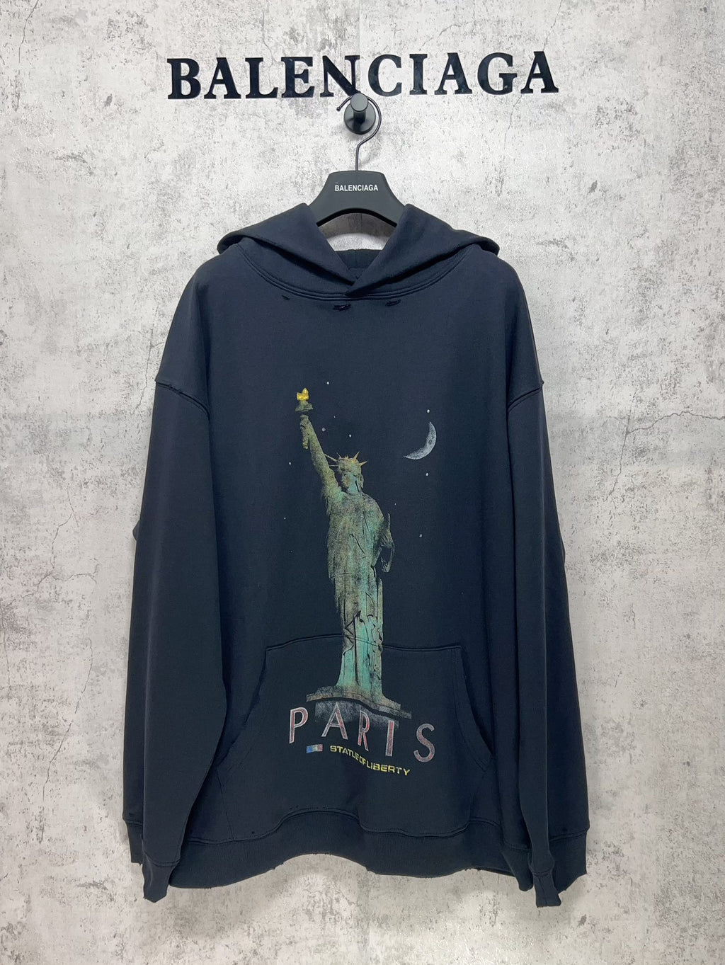 Balenciaga hooded sweatshirt in dark navy with Statue of Liberty and "PARIS" print