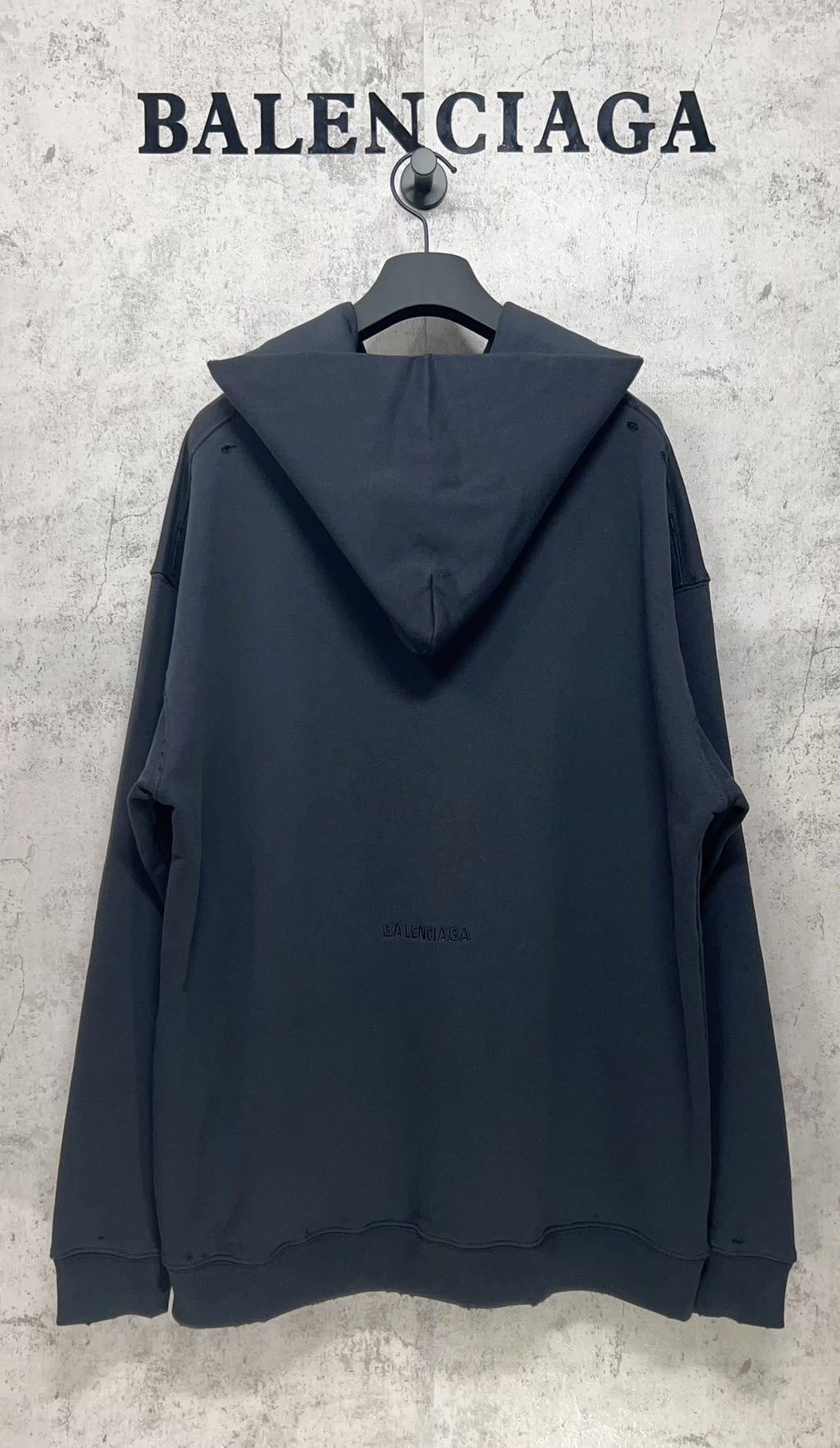 Balenciaga hooded sweatshirt, dark navy, back view with hood and small chest logo