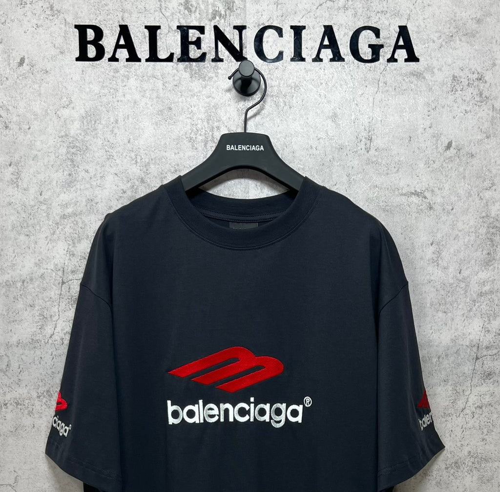 Balenciaga logo T-shirt, dark crewneck with red chest emblem and sleeve detail