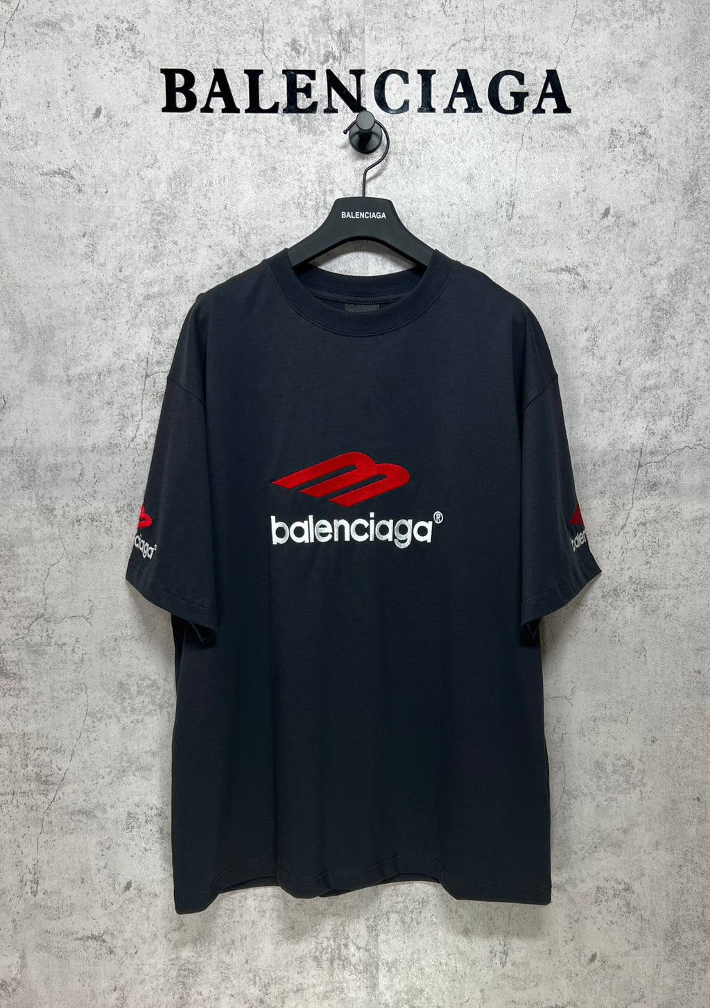 Balenciaga logo T-shirt, dark short-sleeve crewneck with red emblem on chest