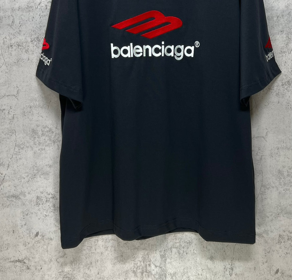 Balenciaga logo T-shirt, dark crewneck with red chest emblem and relaxed hem