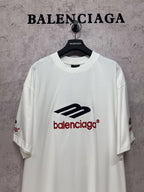White short-sleeve T-shirt with large Balenciaga logo on chest, crew neck.