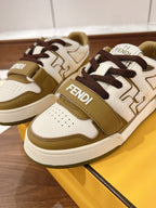 Fendi low-top sneakers front and side view; white with tan panels and dark brown laces