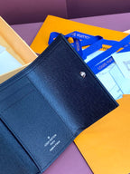 Small bag wallet with textured dark blue leather and front snap button
