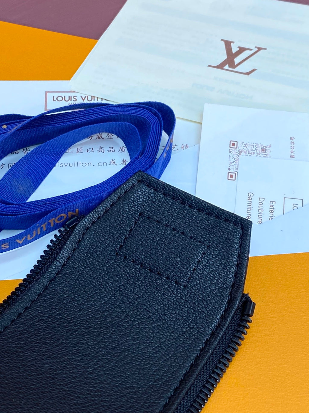 Blue leather bag panel with zipper and stitched trim