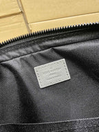 Men's Louis Vuitton bag interior pocket lining with brand patch