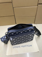 Men's Louis Vuitton crossbody bag, navy monogram with two straps and zip pocket.