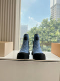 Blue monogram ankle Chelsea boots with black elastic side panels and ribbed rubber soles