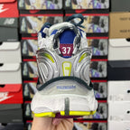 Balenciaga unisex sneakers rear view, blue heel tab and yellow-outlined details