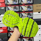 Balenciaga unisex sneakers outsole: bright neon green tread with dark center stripe