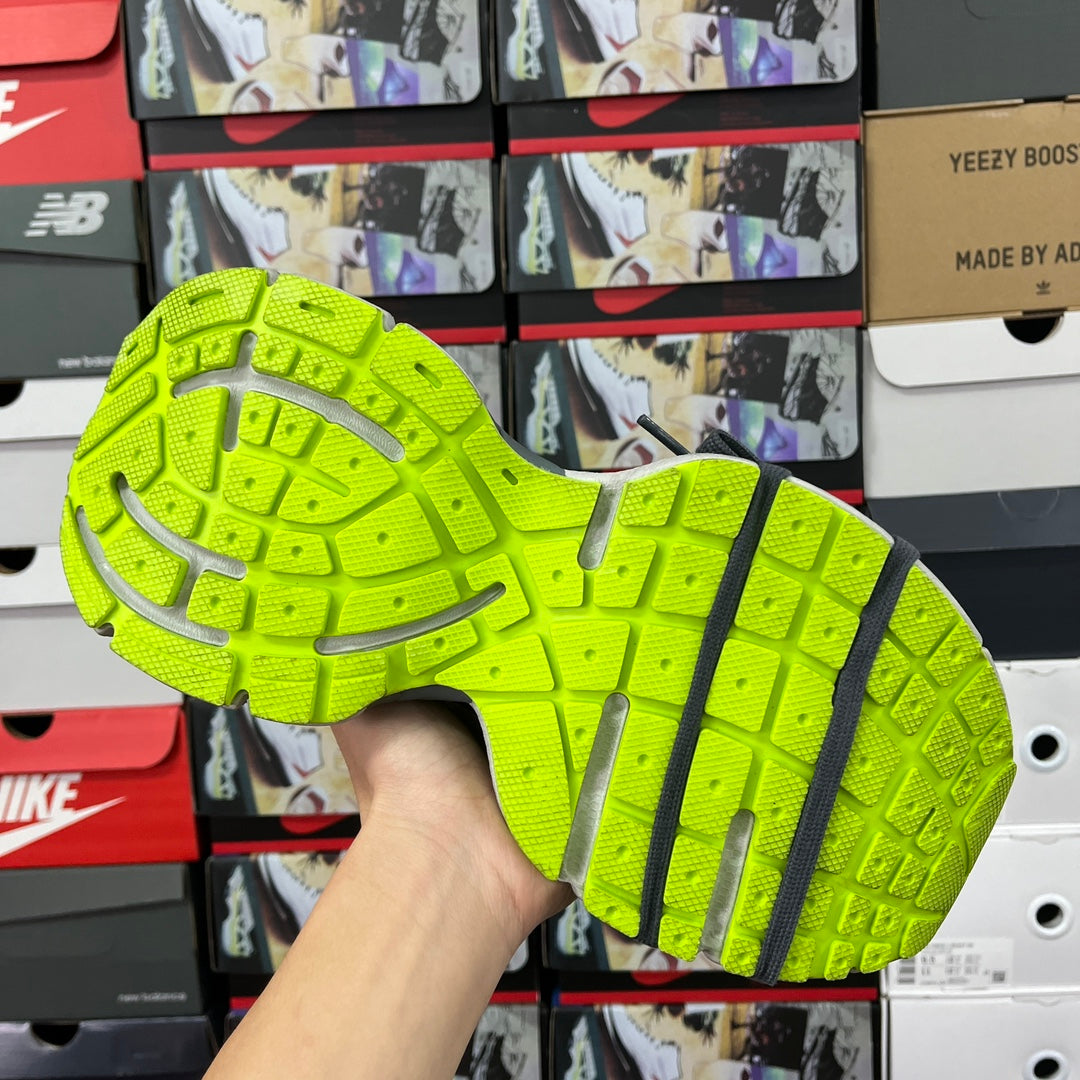 Balenciaga unisex sneakers outsole: bright neon green tread with dark center stripe
