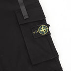 Black cargo shorts with Stone Island patch on flap pocket