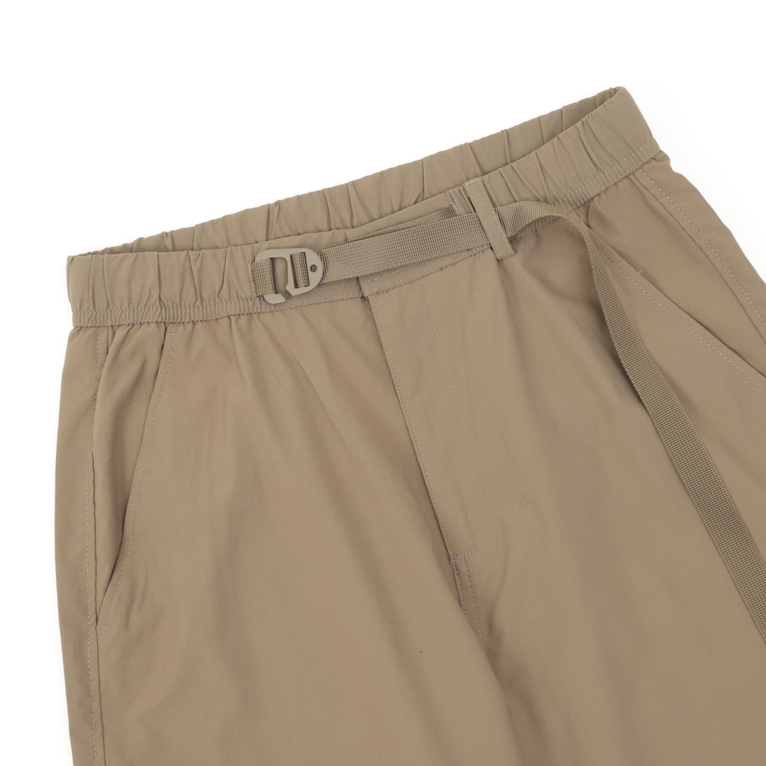 Khaki shorts with front buckle strap at waistband and pleated panel