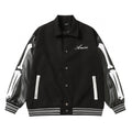 Black varsity jacket with collar, snap buttons, Amiri script logo, ribbed hem and cuffs
