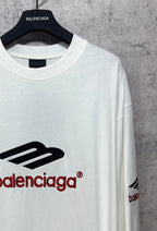 White long-sleeve T-shirt neck and logo detail with black and red Balenciaga print