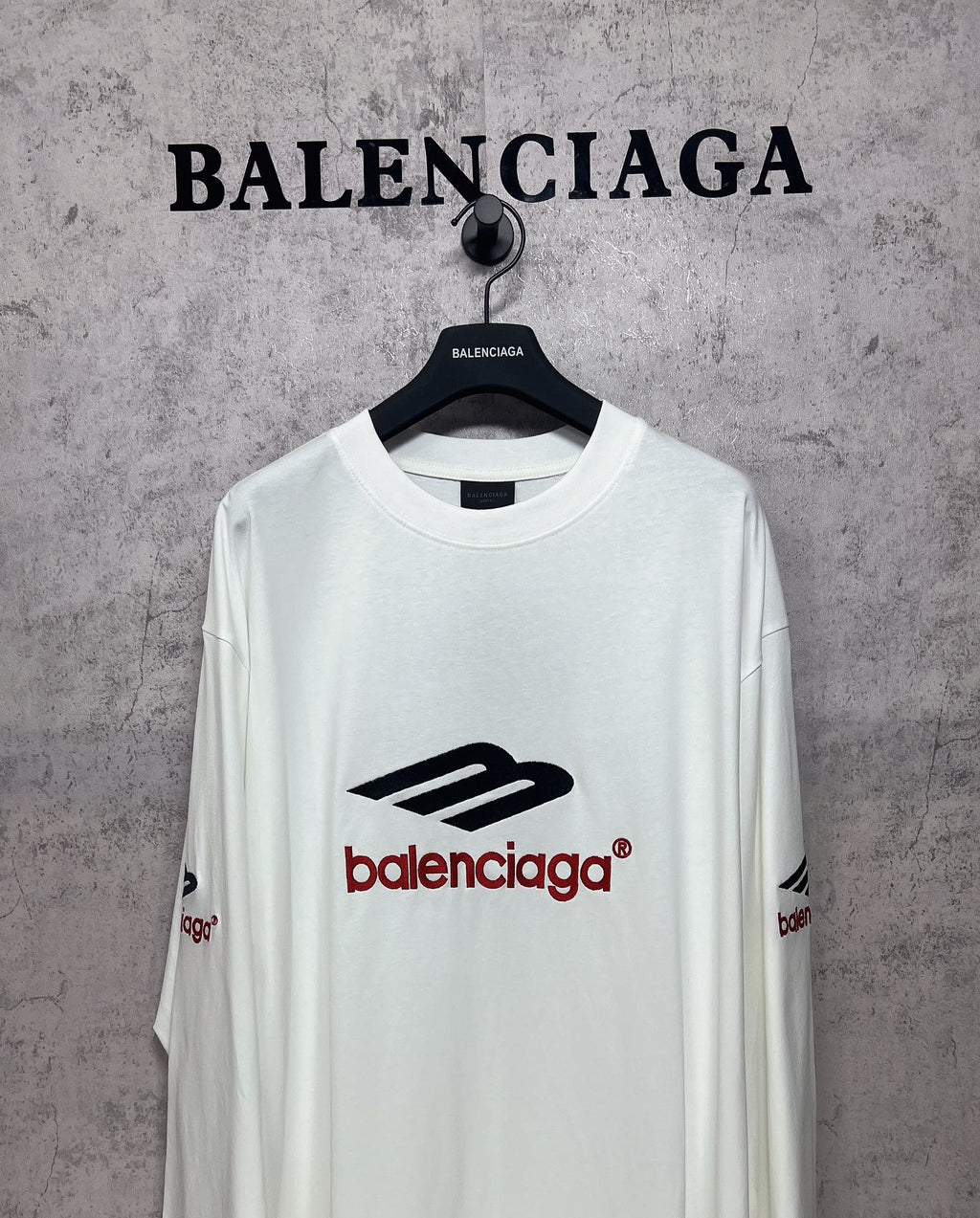 White long-sleeve T-shirt, crew neck, black and red Balenciaga logo on front