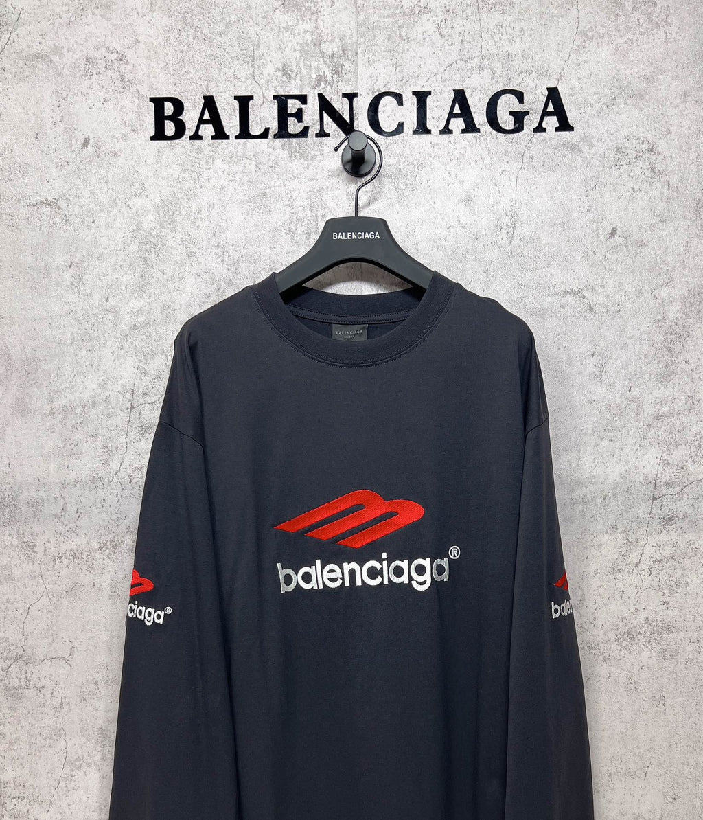 Balenciaga long-sleeve T-shirt, dark navy, close front view with red logo and white brand text