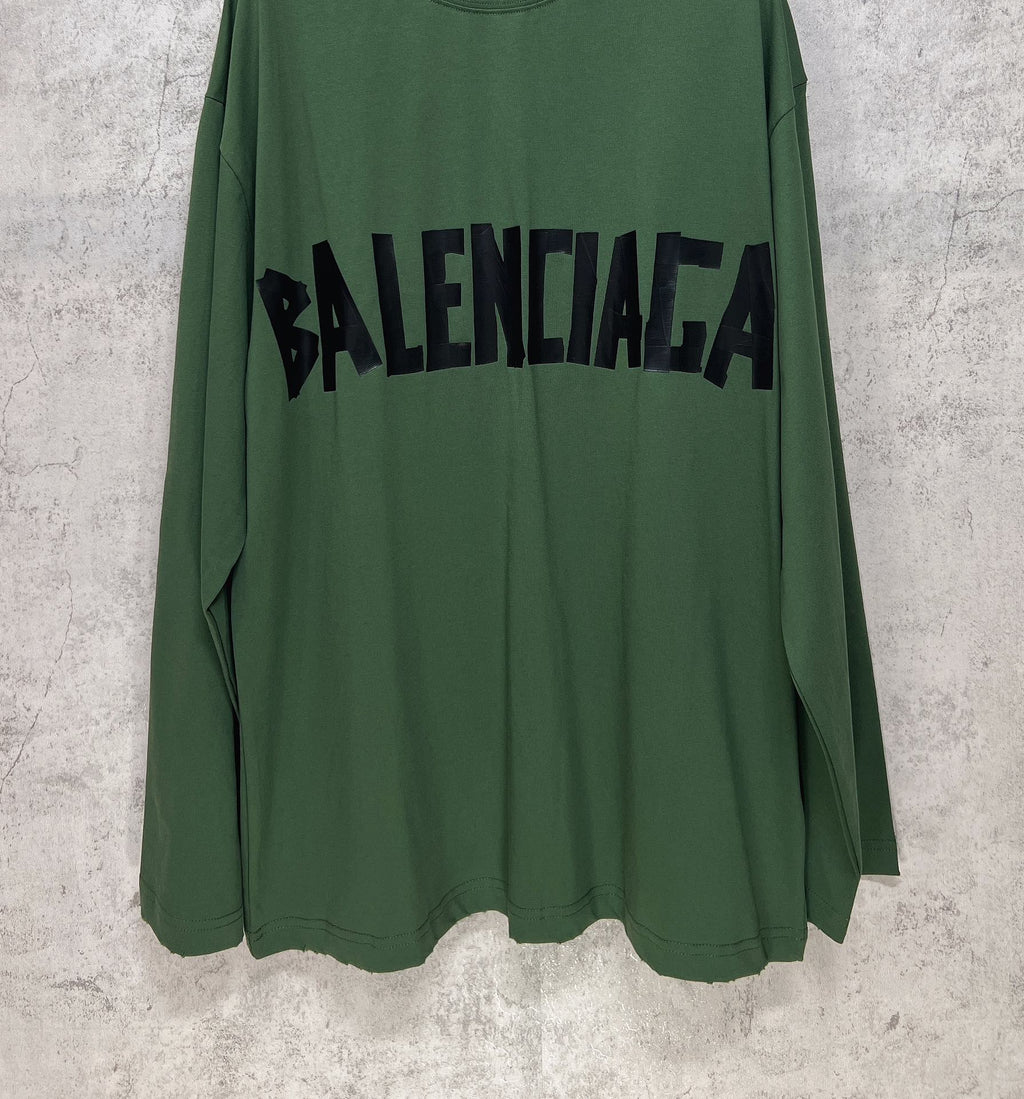 Green long-sleeve T-shirt front view with centered black Balenciaga logo print