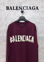 Maroon long-sleeve T-shirt with large Balenciaga front text graphic