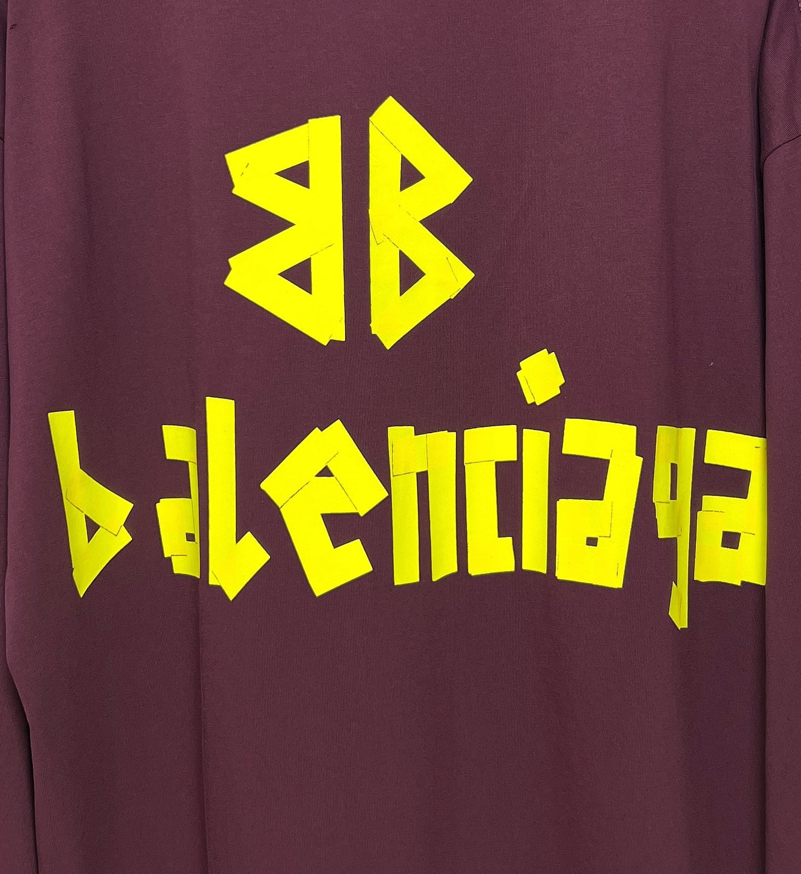 Maroon long-sleeve T-shirt with large yellow Balenciaga back graphic