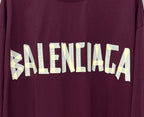 Maroon long-sleeve T-shirt with Balenciaga wordmark graphic on chest