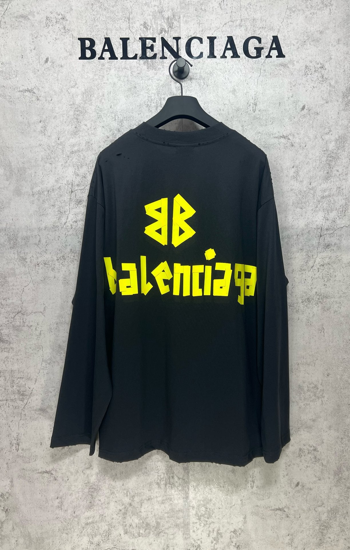 Balenciaga long-sleeve T-shirt, dark with neon green logo print on back