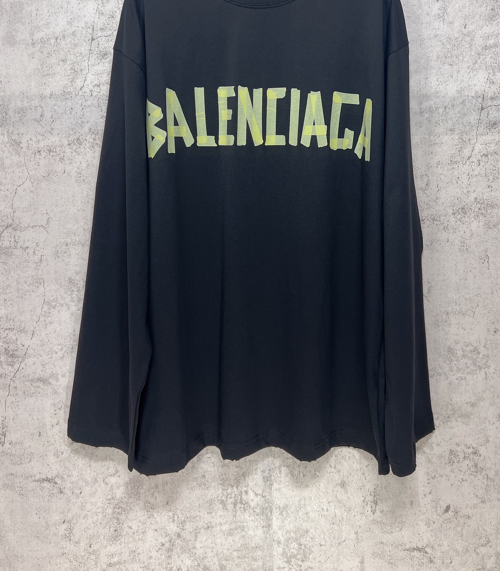 Balenciaga long-sleeve T-shirt with neon green front logo and dark hem