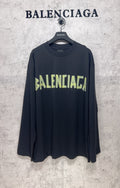 Balenciaga long-sleeve T-shirt, dark with neon green logo print across chest