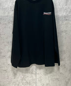 Dark long-sleeve T-shirt with logo at chest pocket area