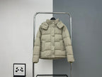 Beige hooded puffer jacket with front zipper and snap pockets