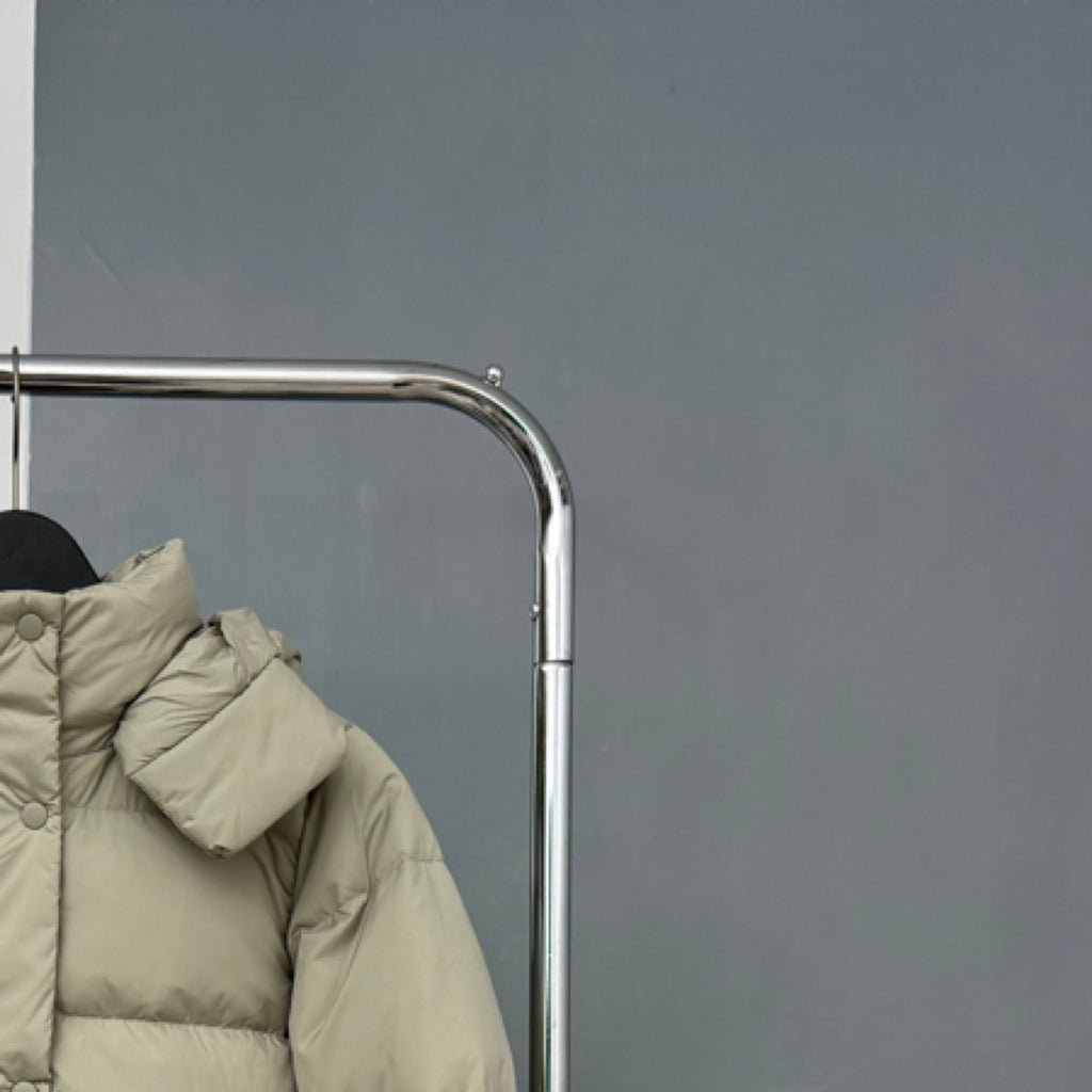Beige hooded puffer jacket sleeve and hood edge detail