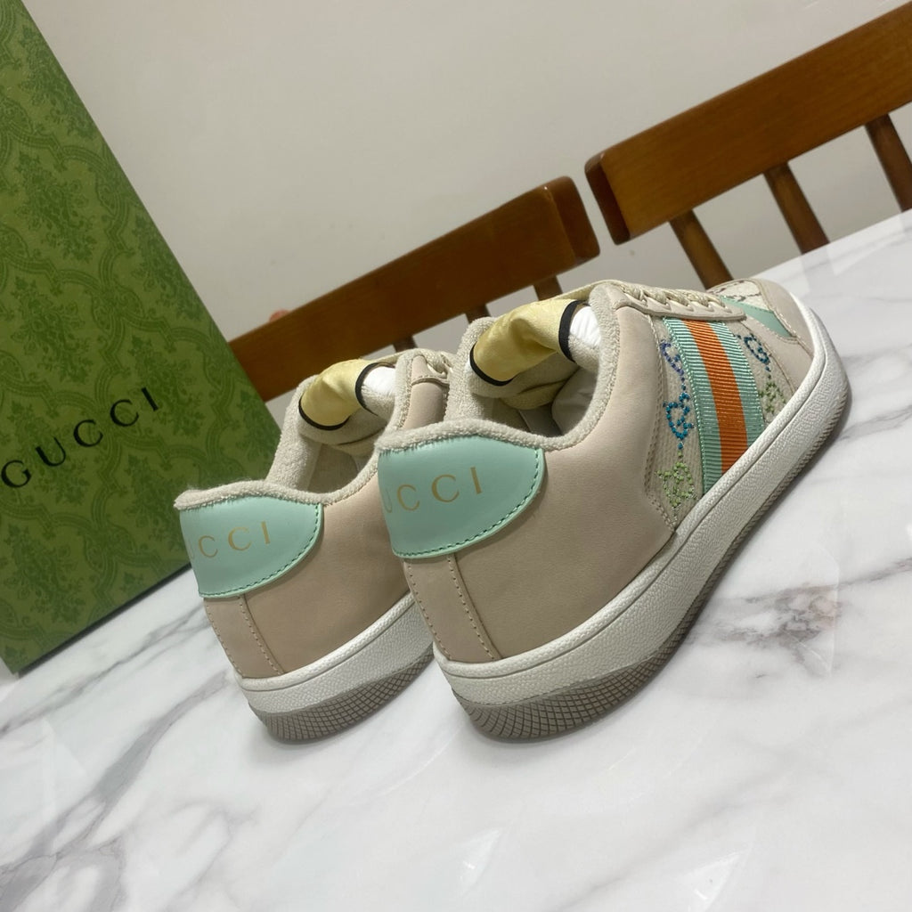 Gucci unisex sneakers, cream with teal trim and rear logo detail