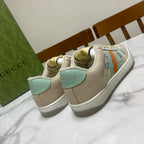 Gucci unisex sneakers, cream with teal trim and rear logo detail