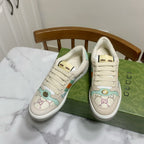 Gucci unisex sneakers, cream with blue floral embroidery and multicolor stripe