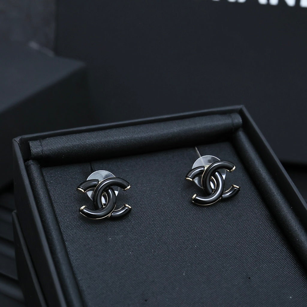 Chanel CC stud earrings with black enamel and silver-tone posts