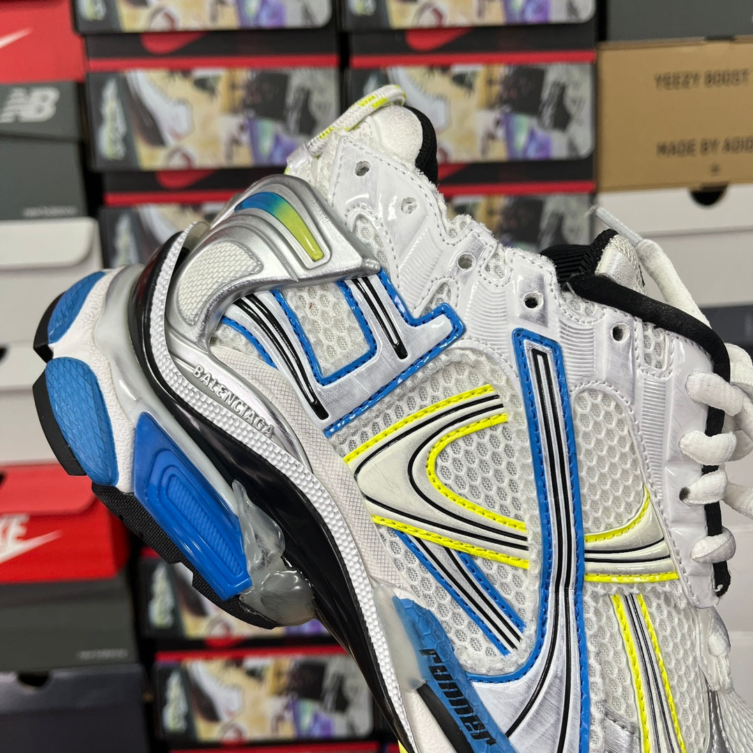 Unisex athletic shoes, white and silver with blue and neon green panels, lace-up