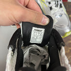 Shoe interior size label on black lining with white product tag details