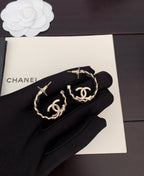 Gold-tone chain hoop earrings with CC logo, pair