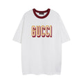 White short-sleeve T-shirt with burgundy striped collar and large GUCCI logo