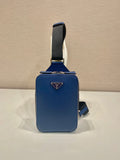 Blue mini crossbody bag with Prada triangle logo and adjustable shoulder strap