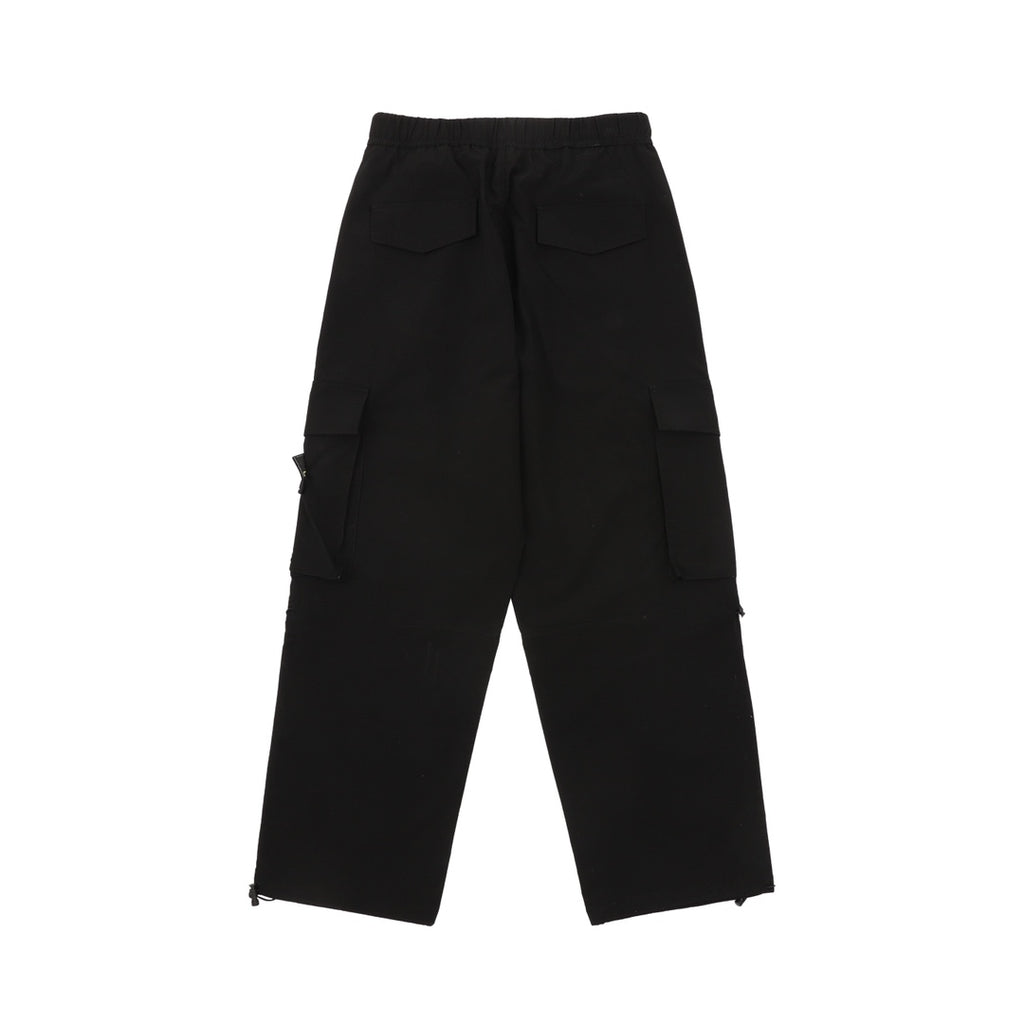Black cargo shorts with flap pockets, knee-length